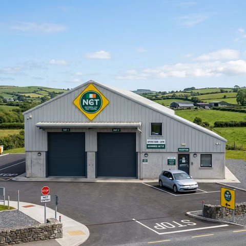 Authentic exterior of Cavan NCT test centre Townparks with cars waiting for inspection 2026